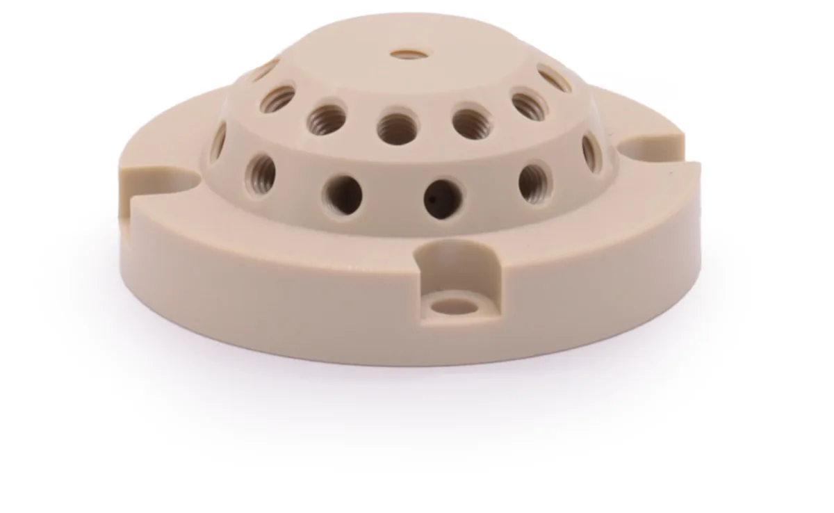 Custom CNC turned and milled PEEK fluidic connector with precision threads for analytical instruments